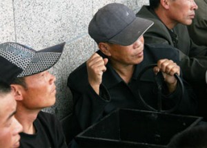 Девять китайцев помещены под стражу за расовую дискриминацию