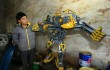 Крестьяне в Китае из деталей старых автомобилей собирают огромных трансформеров6