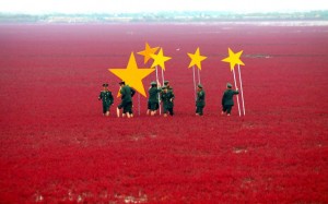 Soldiers turn red marshland into China's national flag, China - 26 Sep 2012...Mandatory Credit: Photo by Quirky China News / Rex Features (1886826a)  Soldiers use stars to turn the marshland into the Chinese flag  Soldiers turn red marshland into China's national flag, China - 26 Sep 2012  To celebrate China